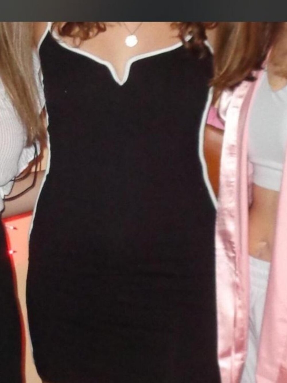 Women_s black mini dress